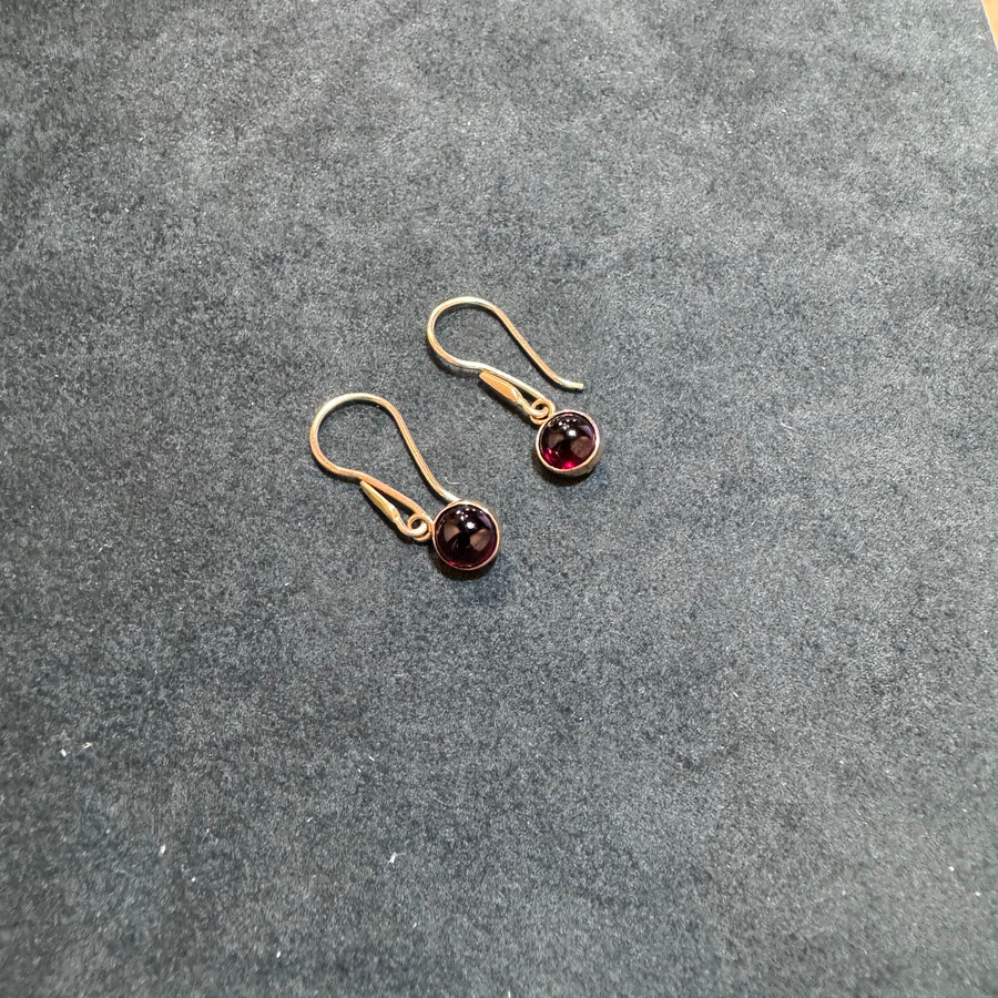 14k yellow 5mm round Garnet earrings